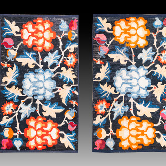 A pair of Tibetan woollen rugs with floral design, 19th C.