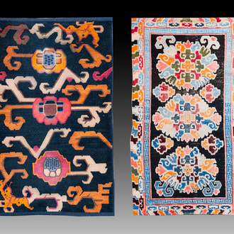 Two Tibetan woollen rugs with floral design, 19th C.