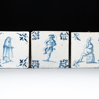 Three blue and white Dutch Delft 'large figures' tiles, 17th C.