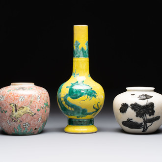 A Chinese wucai 'flying horse' jar, a green-enamelled yellow-ground 'dragon' vase and a Nanking crackle-glazed jar, 19th C.