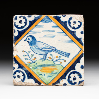 A polychrome Dutch Delft maiolica 'bird' diamond tile, late 16th C.