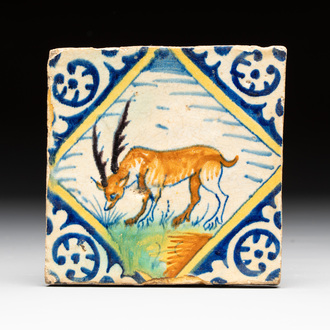 A polychrome Dutch Delft maiolica 'stag' diamond tile, late 16th C.