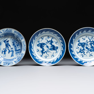 A pair of Chinese blue and white 'dragon' plates and a plate with narrative design, Yuzhen mark, Kangxi/Yongzheng