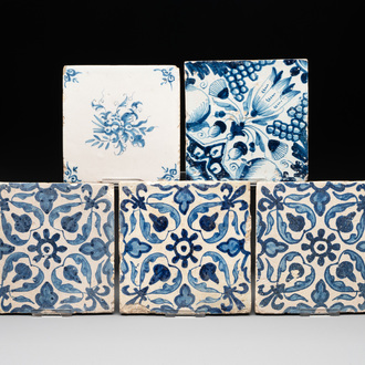 Five blue and white Dutch Delft tiles with floral design, 17th C.