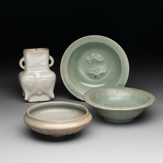 Three Chinese Longquan celadon saucers and an archaistic ge-type vase, Ming/Qing