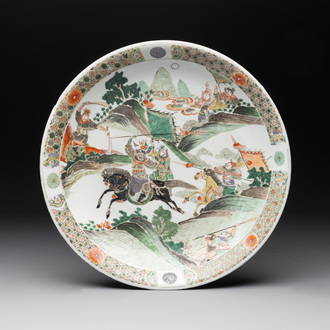 A Chinese famille verte 'warriors on horseback' dish, lingzhi mark, Kangxi