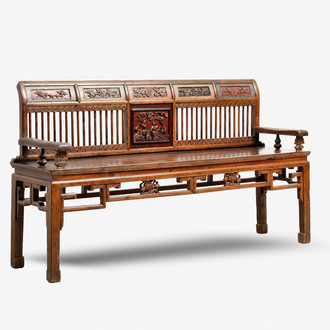 A Chinese carved and lacquered wooden bench, 19th C.