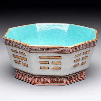 A Chinese iron-red gilt-decorated octagonal 'trigrams' bowl, Tongzhi mark and of the period