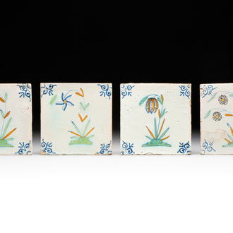Four unusual polychrome Dutch Delft 'flower' tiles, 17th C.