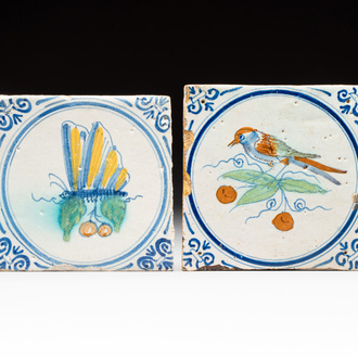 Two polychrome Dutch Delft 'dragonfly' and 'bird' medallion tiles, Haarlem, 17th C.