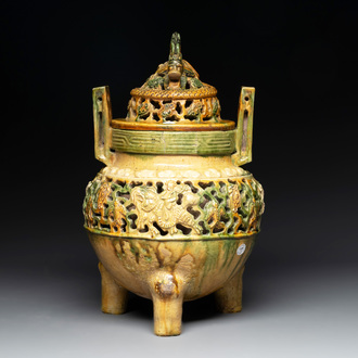 A Chinese sancai-glazed reticulated double-walled tripod censer and cover, Ming