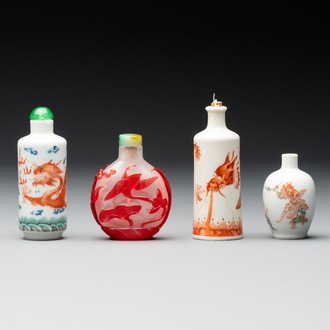 Three Chinese porcelain snuff bottles and a red Peking glass snuff bottle, Daoguang and Tongzhi mark, 19th C.