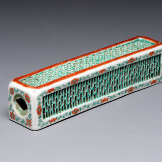 A Chinese iron-red and green-enamelled reticulated incense stick holder, 19th C.