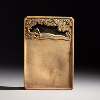A Chinese ink stone with phoenix and carp design, Qianlong mark and possibly of the period