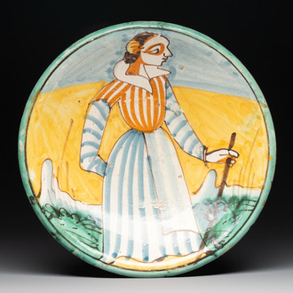 An Italian maiolica dish with a lady, Montelupo, 17th C.