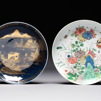 A Chinese gilt-decorated powder-blue plate and a famille verte plate with flowers, Kangxi/Qianlong