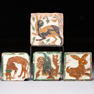 Four polychrome Spanish tiles with animals, 16/17th C.