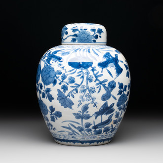 A Chinese blue and white 'birds among flowers' vase and cover, Kangxi