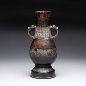 A fine Chinese archaistic bronze 'hu' vase with dragon handles, Yuan