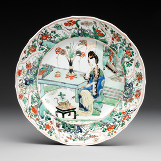 A Chinese famille verte 'lady and her cat' dish, Ding mark, Kangxi
