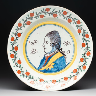 A polychrome Dutch Delft orangist royal portrait plate, 18th C.