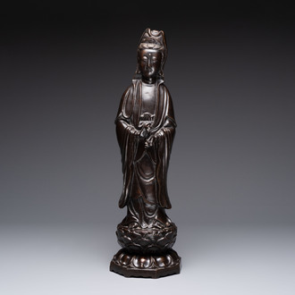 A Chinese bronze Guanyin standing on a lotus throne, 19th C.