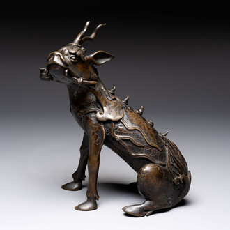 A fine Chinese bronze incense holder in the form of a qilin, Ming