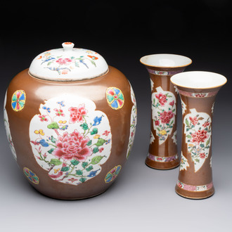 A Chinese famille rose capucin-brown-ground covered jar and a pair of beaker vases, Qianlong