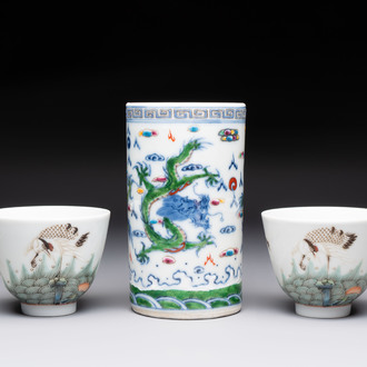 A pair of Chinese famille rose 'crane' cups and a 'dragon' brush pot, Guangxu mark, 20th C.