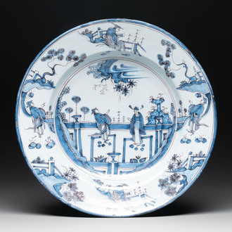 A blue and white 'figures in a garden' chinoiserie dish, Frankfurt, 17th C.