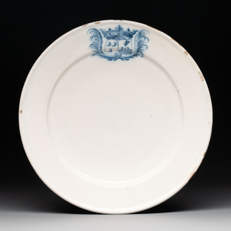 A blue and white Dutch Delft armorial dish, 17th C.