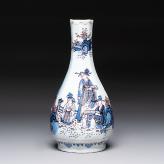 A blue, white and manganese Dutch Delft octagonal chinoiserie bottle vase, 17th C.