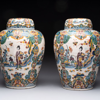 A rare pair of polychrome Dutch Delft chinoiserie jars and covers, 18th C.
