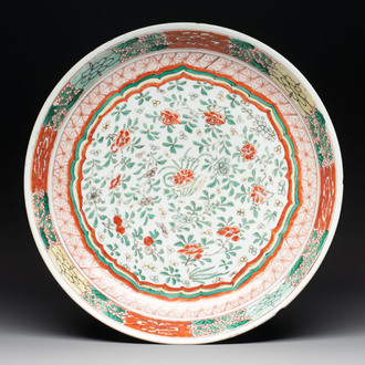 A Chinese wucai dish with floral design, Kangxi mark and of the period
