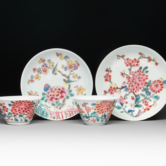 Two Chinese famille rose cups and saucers with birds and flowering branches, Yongzheng
