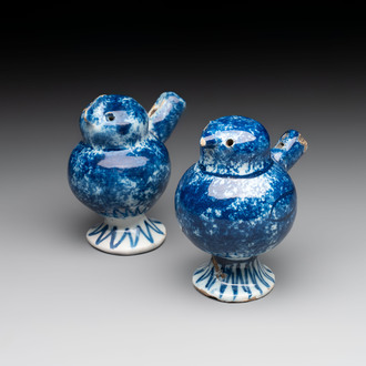 A pair of blue and white Dutch Delft 'bird' whistles, 18th C.