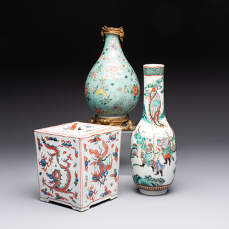 A Chinese wucai square covered container, a gilt bronze-mounted famille verte vase and a Canton famille verte bottle vase, Kangxi and later