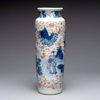 A Chinese gilt and iron-red decorated blue and white rouleau vase with figural design, 19/20th C.