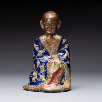 A Chinese champlevé figure of Luohan, Qianlong mark, 18/19th C.