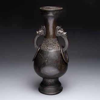 A large Chinese bronze 'hu' vase with luduan-form handles, Yuan