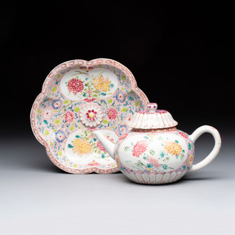A Chinese famille rose moulded teapot and stand with floral design, Yongzheng/Qianlong