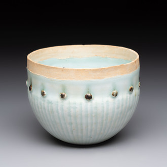 A Chinese russet-glazed qingbai Buddhist bowl, Song or later