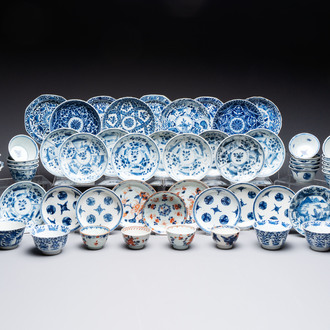 26 Chinese blue, white and Imari-style cups and 28 saucers, Kangxi and later
