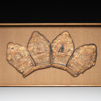 A framed Tibetan silk-embroidered four-leaf ritual crown with Transcendent Buddhas, Tibet, 18th C.
