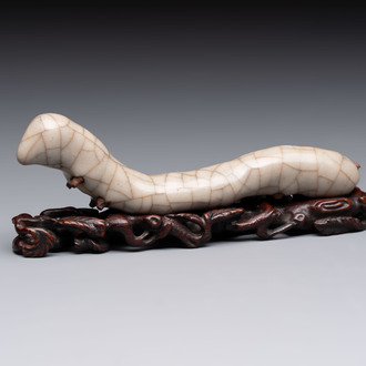 A rare Chinese ge-type model of a silkworm on wooden stand, 18th C.