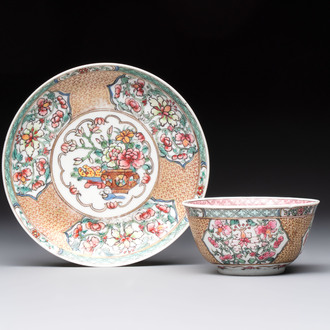 A fine Chinese gilt-decorated famille rose 'flower basket' cup and saucer, Yongzheng