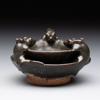 A rare Chinese black-glazed two-tier oil lamp with three rats, Ming