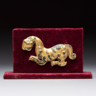 A rare Chinese gilt-bronze 'tiger' ornament, Han