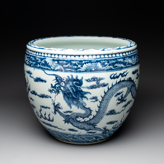 A Chinese blue and white 'dragon' fish bowl, 19th C.
