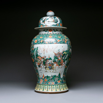 A very large Chinese famille verte 'warriors on horseback' vase and cover, 19th C.